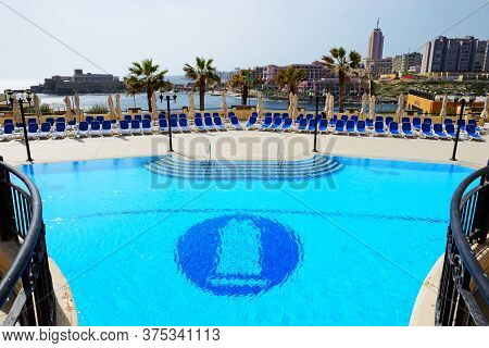 St Julians, Malta - April 24: The Swimming Pool At Corinthia St Georges Bay Luxury Hotel On April 24