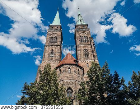 Nuremberg, Germany - June 4 2020: Famous St. Sebaldus Church Facade In Nuremberg, Germany, Over Deep