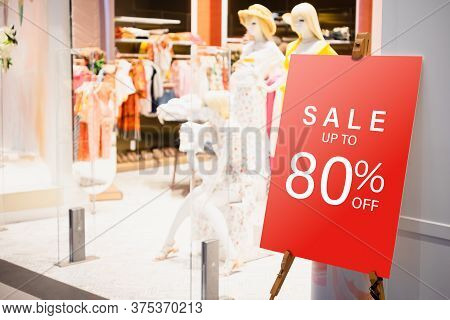 Sale Label Billbord Stand Template In Front Of Female Clothing Store For Sale Promotion And Discount