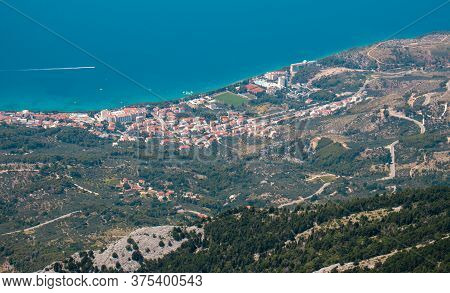 Zoomed In View Of The Town Of Tucepi, Seen From The Biokovo Mountain Twenty Kilometers Away. Small T