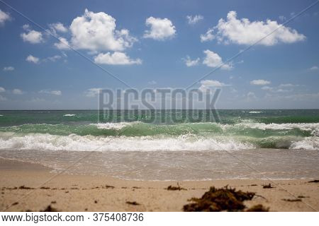 Waves On Beautiful Sea Troical Sandy Beach With Blue Sky