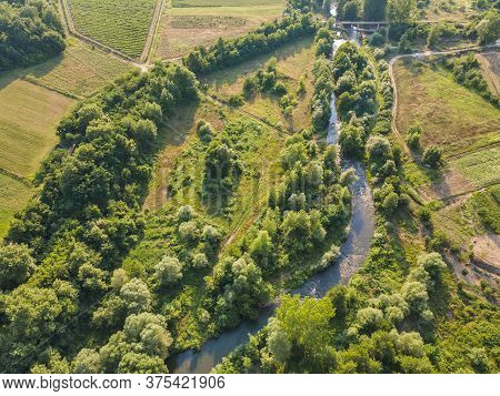 Aerial View Of Strumeshnitsa River Passing Through The Petrich Valley, Bulgaria
