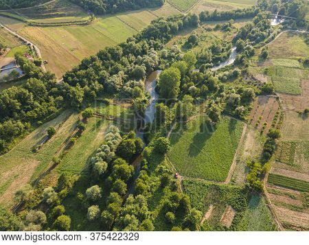 Aerial View Of Strumeshnitsa River Passing Through The Petrich Valley, Bulgaria