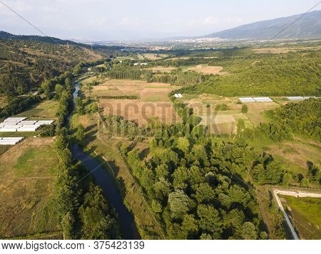 Aerial View Of Strumeshnitsa River Passing Through The Petrich Valley, Bulgaria