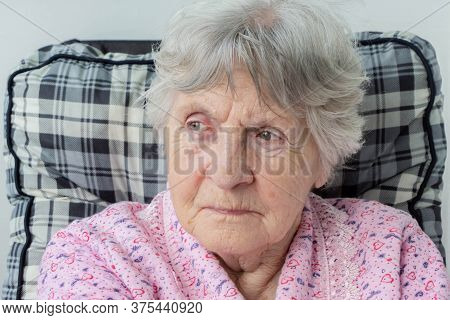 Portrait Of Old Senior Woman With Wrinkles On Face And Gray Hair. Eldery Lady With Wrinkled Face. Cl