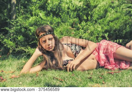 Portrait Of Beautiful Cute Brunette Teenager Model With Makeup, Poreo, In Summer Colorful Swimsuit P