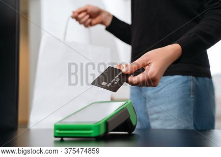 Hand Of Woman Customer Using Wireless Or Contactless Payment By Credit Card, Girl Making Shopping.  