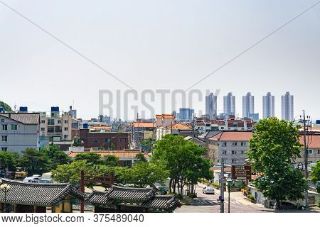Gimhae, South Korea - June 18, 2017 : Korean Community Mix With Old Traditional House And Modern Tal