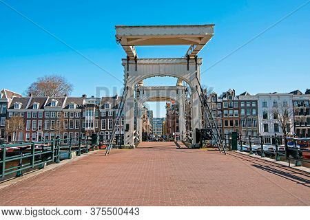 City scenic from Amsterdam at the Tiny bridge in the Netherlands