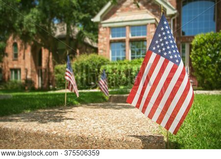 American Flags Displayed In The Front Of A Southern Home In Honor Of The 4th Of July