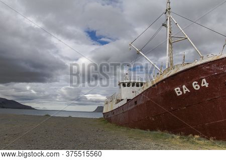 An Out-of-the-way Whaling Ship That Rusts On The Road To Látrabjarg On A Dead Cloudy Day. The Shipwr