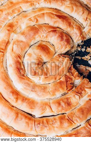Filo Spinach And Feta Twist Pie In The Iron Pan After Oven. Authentic Greek Bakery. With Spinach, Mi