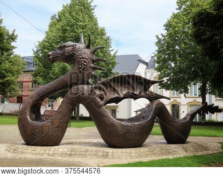 Dragon Of Mersch. Bronze Sculpture And Fountain By P.eyschen. Mersch, Luxembourg - July 4, 2020