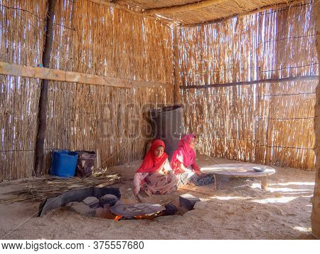Bedouin Village In Desert, Egypt - February 2020: Bedouin Shack Made Of Wood And Yellow Cane, Medium