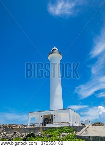 Summer Refreshing Blue Sky And Cape Zanpa Cape Lighthouse And Sea, A Tourist Spot In Okinawa