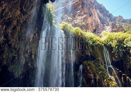 Waterfall And Mossy Rocks In Canyon Long Exposure. Yerkopru Waterfall, Ermenek River, Mut, Mersin Pr