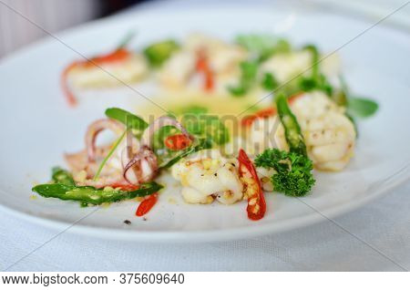 Stir Fried Squid With Chilli And Brocolli
