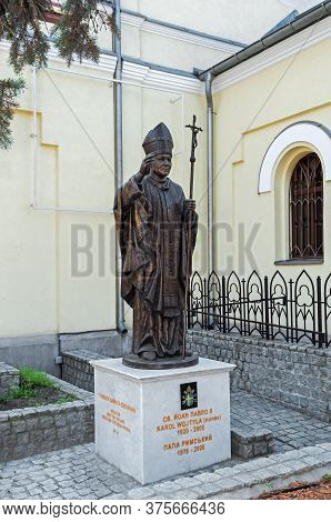Dnipro, Ukraine - April 08, 2020: Monument To Pope John Paul Ii (karol Wojtyla) Near The Roman Catho