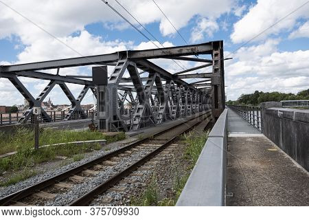 Temse, Belgium, July 05, 2020, The Railway Across The Scheldt On The Bridge Of Temse And The Pedestr