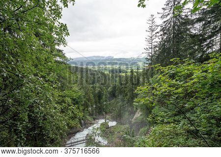View Of The Schwarzbach River And Gollinger Waterfall From Above. Austria