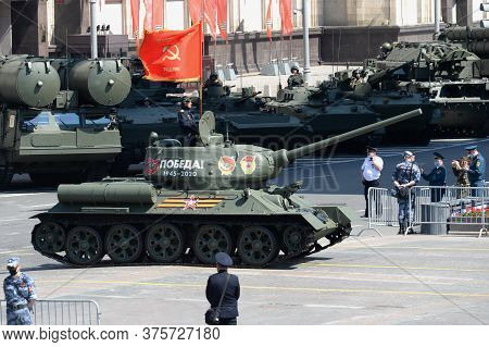 Moscow, Russia - June 24, 2020:t-34-85 Medium Tank With A Red Banner On Okhotny Ryad During The Para