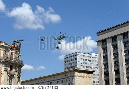 Moscow, Russia - June 24, 2020:military Transport Mi-26 And Multi-purpose Mi-8amtsh Helicopters In T