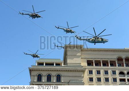 Moscow, Russia - June 24, 2020:military Transport Mi-26 And Multi-purpose Mi-8amtsh Helicopters In T
