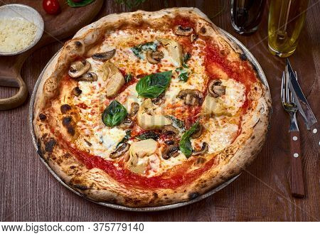 Delicious Pizza With Artichokes And Parmigiano Cheese Flakes