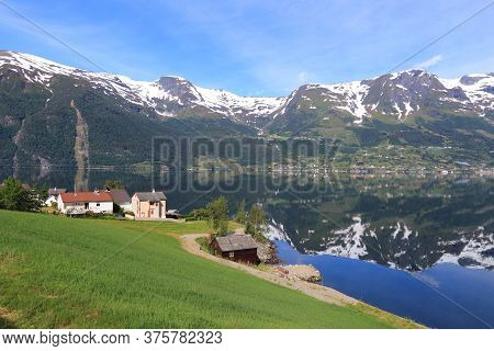 Ullensvang Village. Norway Fiord Landscape - Part Of Hardanger Fjord Called Sorfjord. Morning View.