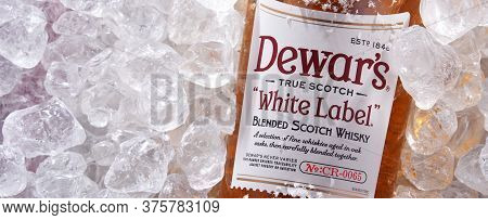 Bottle Of Dewars Blended Scotch Whisky In Crushed Ice
