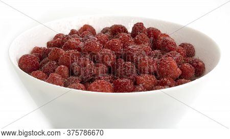 Fresh Raspberries With Water Drops In White Plate On A White Background. Summer, Sweet Berry.
