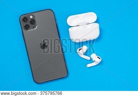 Rostov, Russia - July 06, 2020: Smartphone Apple Iphone 11 Pro Of Space Gray Color And Wireless Head