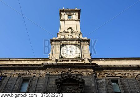 Milan, Italy - April 17, 2018. Ancient Clock Tower Of The Giureconsulti Palace Also Known As Palazzo