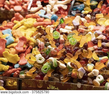 Candies Of Different Types And Colors Close Up. Photographed In Front Of The Store.