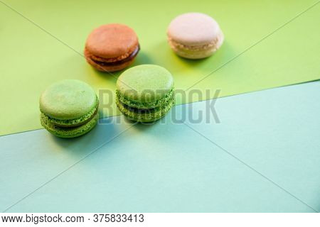 Flat Lay Of Colorful Unstable French Macaroon Cookies Like Background, Dessert Concept.pop Art Color