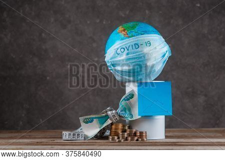 Financial Crisis Of Oil On The Planet Associated With The Epidemic. Globe With A Bandage And A Barre