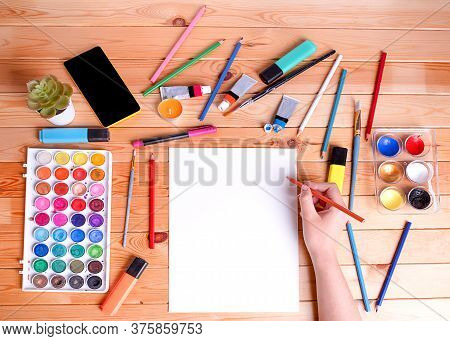 Mockup For Drawing And Painting.  Hands Holding The Pencil And Drawing On White Paper.  View From Ab