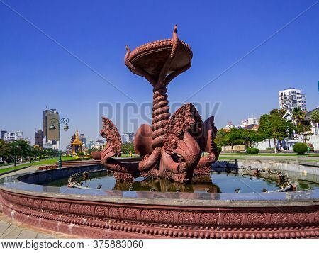 Phnom Penh, Cambodia - January 9, 2020: View Of The Naga Fountain In The Preah Suramarit Boulevard W