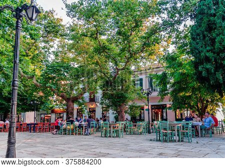 Lafkos / Greece - July 4 2020: View Of The Historic Square Of The Village, With Cafeterias And Resta
