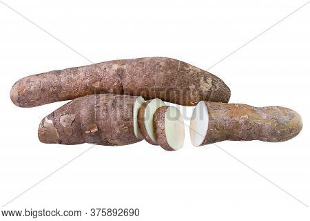 Cassava Tubers And Sliced Isolated On White, Pile Cassava Manioc In Top View, Yucca Root For Flour P