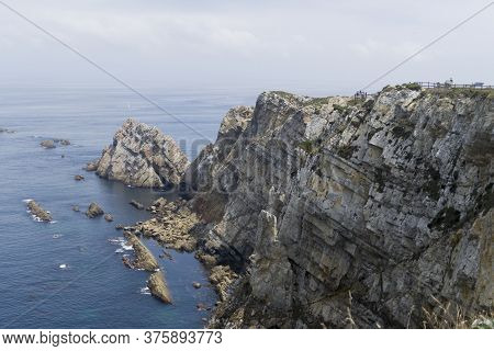 Lighthouse Cabo De Peñas, Asturias.
The Cabo Peñas Lighthouse Is Located On The Most Outgoing Platea