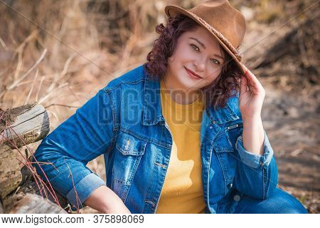 Mature Plus Size Woman, American Or European Appearance Walks And The  Enjoying Life. Lady With Exce