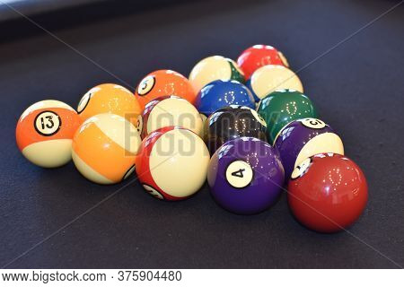Black Billiard Table, Playing Snooker Pool 8Ball - Close-up Shot Of A Man Playing Billiard