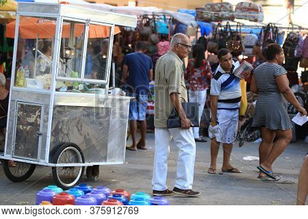 Salvador, Bahia / Brazil - March 19, 2018: Elderly Man Is Seen In The Square In The City Of Salvador