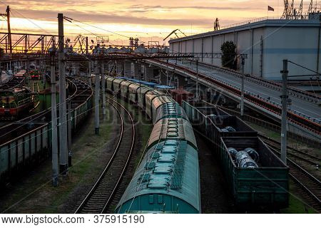 View Of The Railway From The Bridge At Sunset