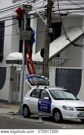 Salvador, Bahia / Brazil - September 5, 2014: Technicians Are Seen Doing Maintenance On Photosensor 