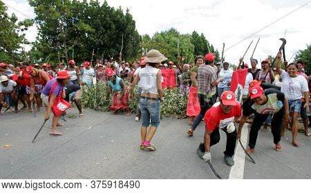 Eunapolis, Bahia / Brazil - March 1, 2011: Women From The Landless Movement Block Br 101 Highway In 