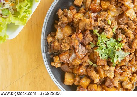 Stir Fried Pork With Onion And Garlic And Black Soy Sauce And Coriander Topping And Tofu With Vegan 