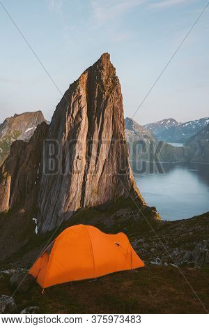 Camping Tent And Segla Mountain Nature Landscape In Norway Travel In Wilderness Concept Adventure Su
