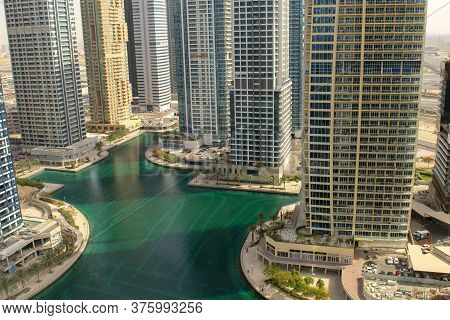 Dubai/uae - June 10, 2020: View Of Jlt Clusters, New Modern District With Turquoise Colored Lake In 